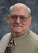 John E.